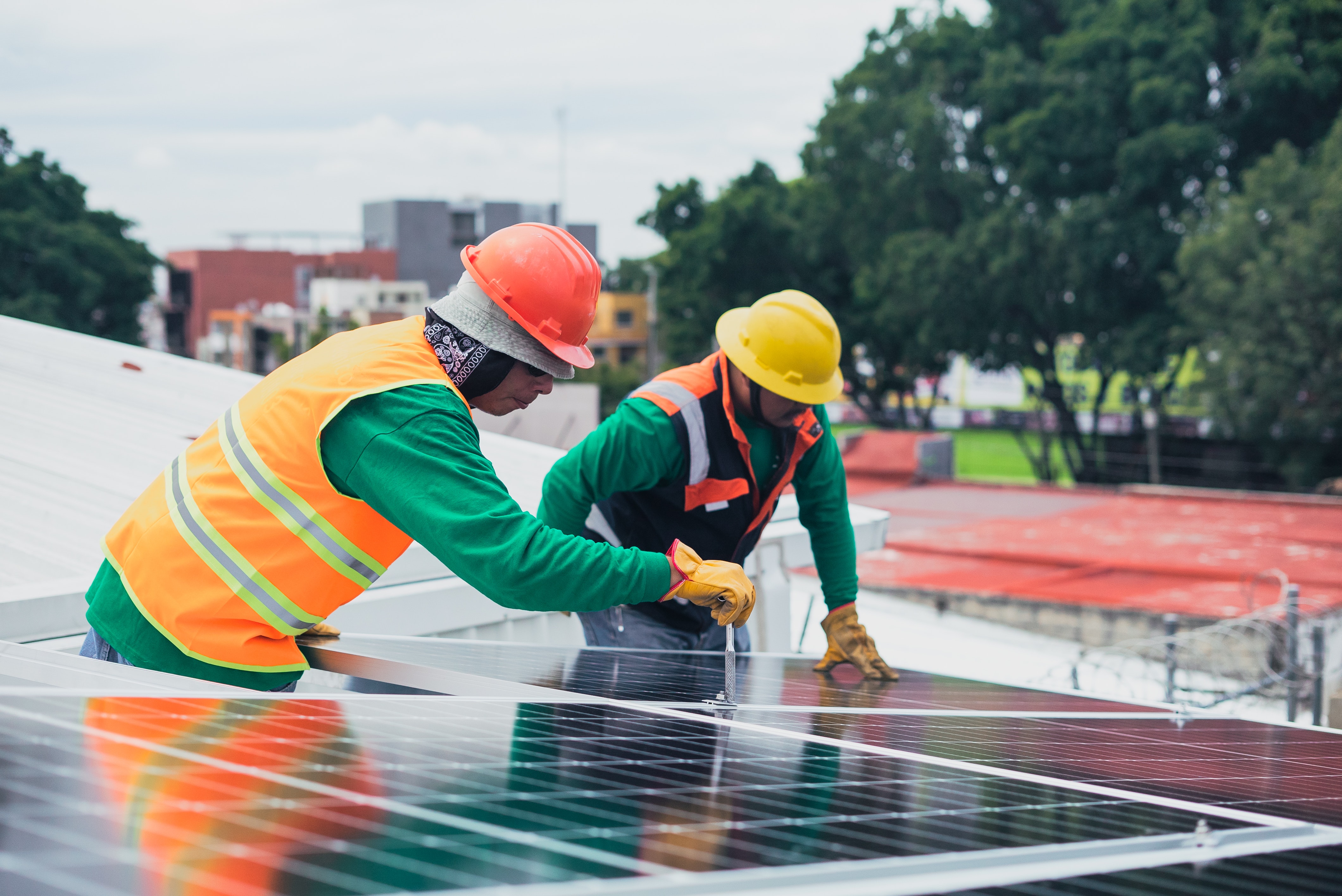 Construction Contractors working on solar panels